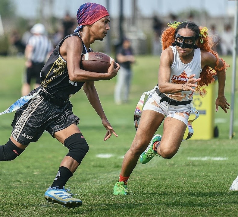 Asia Smiley pursuing a ball carrier in current flag football competition